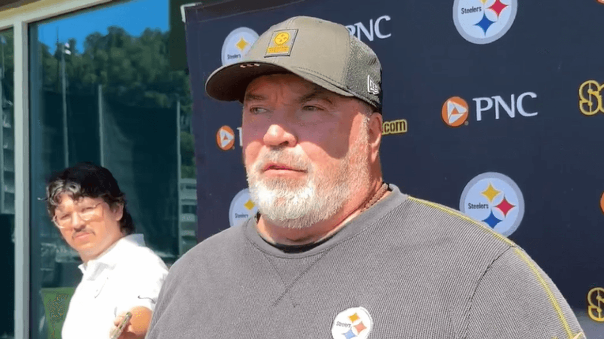 Mike McCarthy speaking before practice