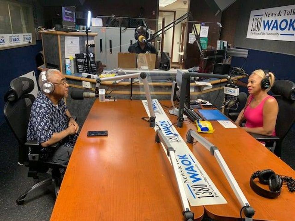 Mike Roberts and Carol Blackmon discussing their working relationship history on V-103 in the 90