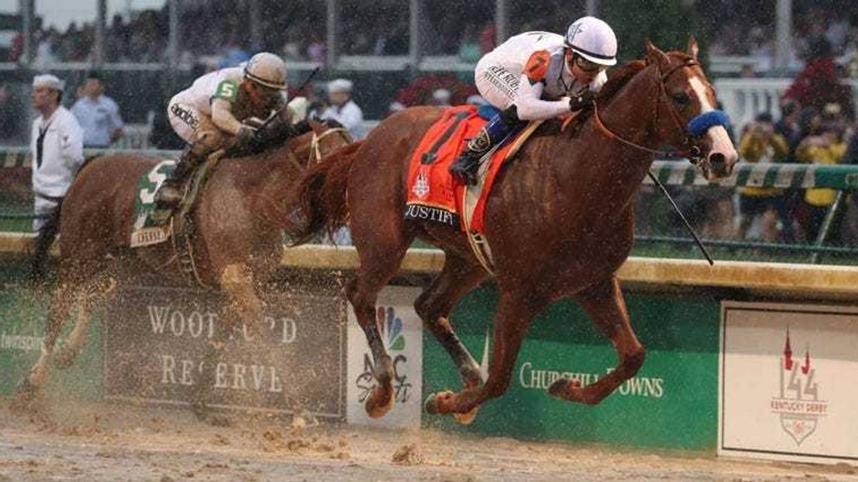Mike Smith aboard Justify (7) beats Javier Castellano aboard Audible (5) to the finish line to win the 144th running of the Kentucky Derby on May 5, 2018, at Churchill Downs in Louisville, Kentucky.