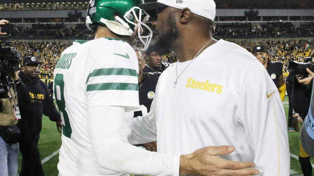 Mike Tomlin and Aaron Rodgers after a game