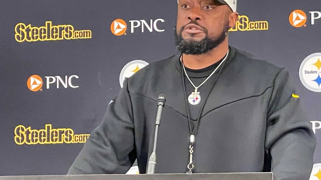 Mike Tomlin at a podium