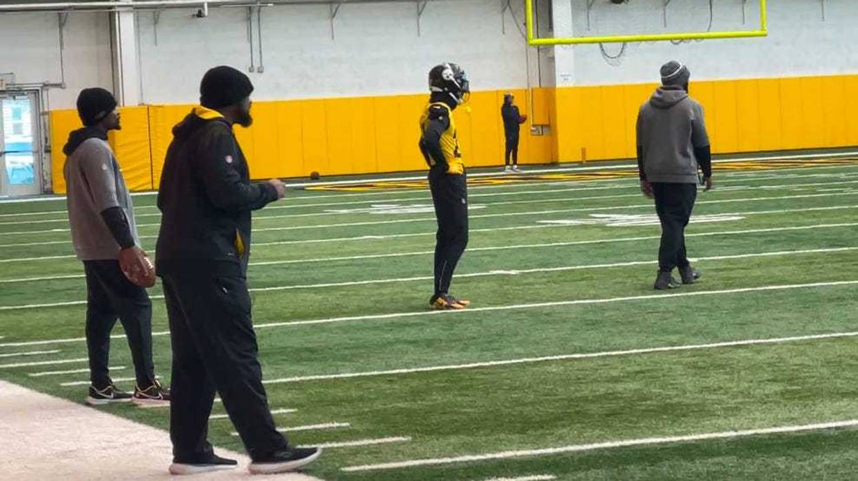Mike Tomlin with Cory Trice in the back