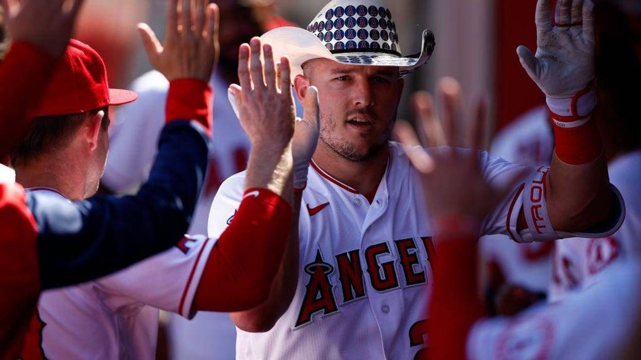 Mike Trout #27 of the Los Angeles Angels celebrates a home run against the Texas Rangers in the fourth inning at Angel Stadium of Anaheim on October 02, 2022 in Anaheim, California.