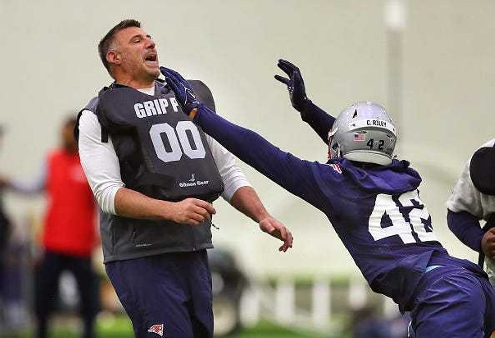 Mike Vrabel and Cam Riley
