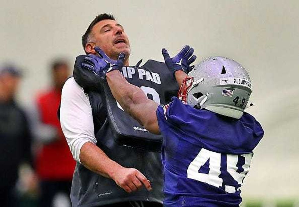 Mike Vrabel and Cam Riley