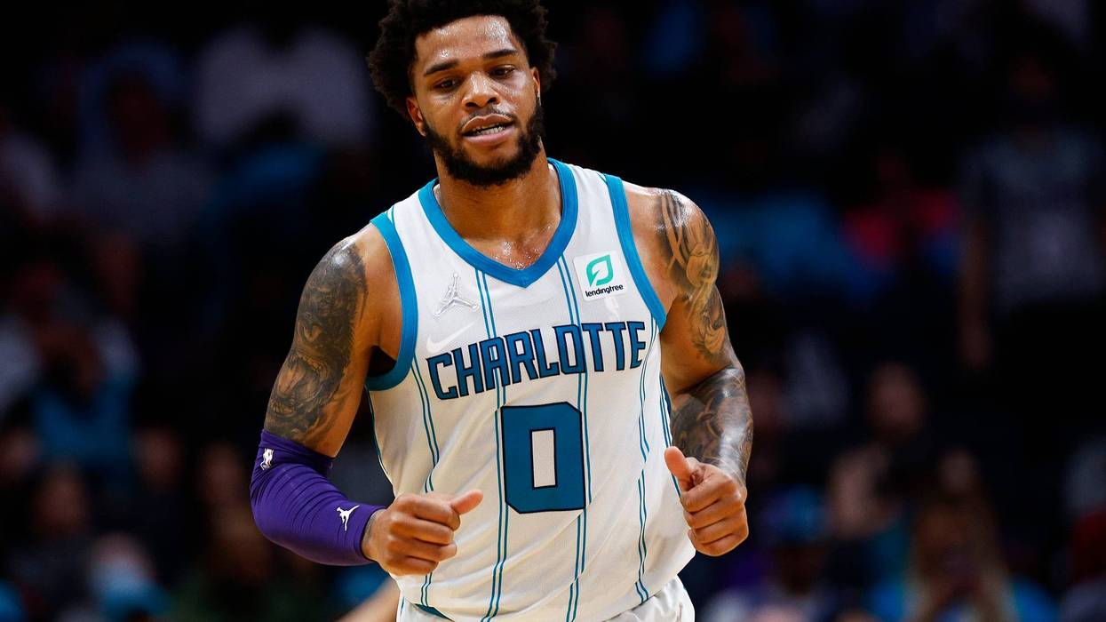 Miles Bridges #0 of the Charlotte Hornets runs down court in the first half of the game against the Toronto Raptors at Spectrum Center on February 25, 2022 in Charlotte, North Carolina.
