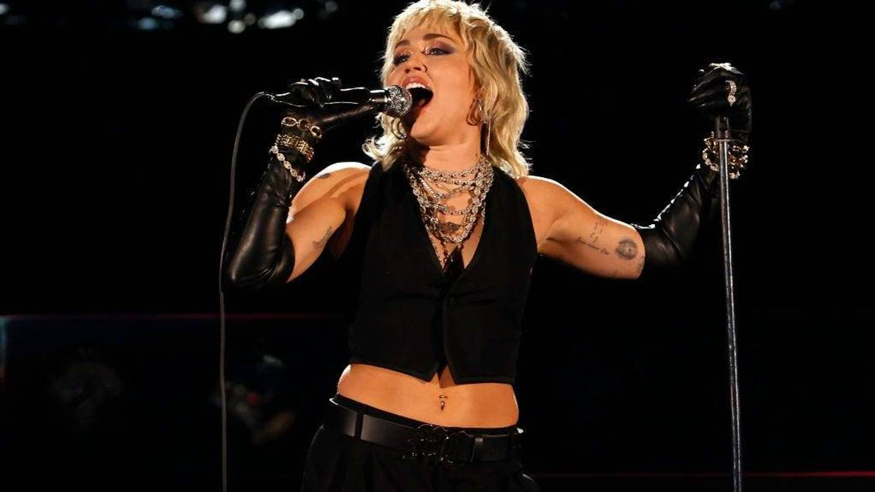 Miley Cyrus performs a Tribute to Frontline Heroes during the 2021 NCAA Final Four at Lucas Oil Stadium on April 03, 2021 in Indianapolis, Indiana.