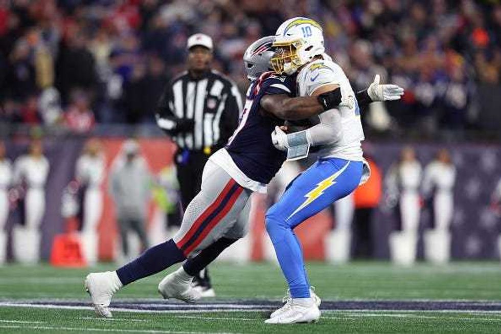 Milton Williams and Justin Herbert