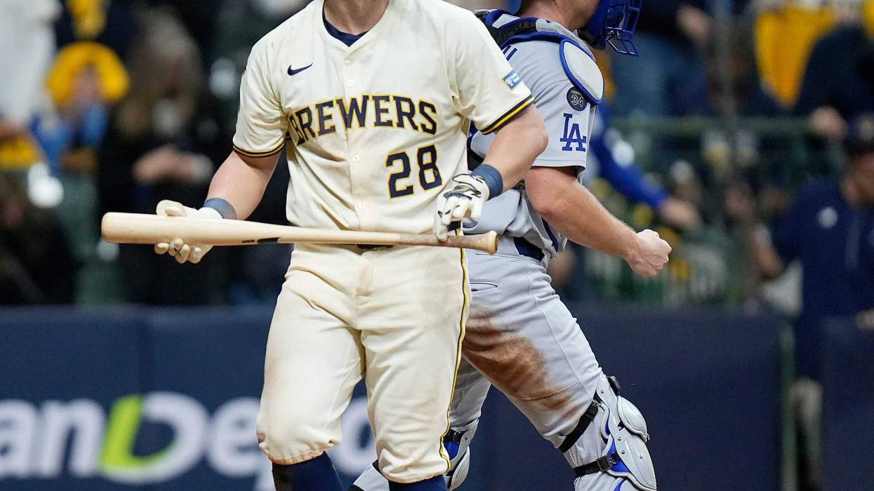 Milwaukee Brewers first baseman Andrew Vaughn (28) reacts after striking out swinging during the ninth inning of the National League Championship Series game October 14, 2025 at American Family Field in Milwaukee, Wisconsin.