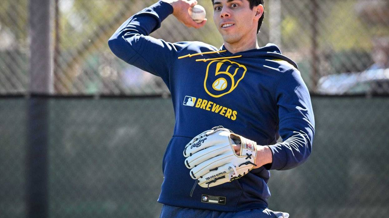 Milwaukee Brewers outfielder Christian Yelich throws during spring training workouts Saturday, February 15, 2025, at the American Family Fields of Phoenix in Phoenix, Arizona.