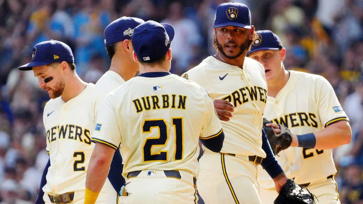 Milwaukee Brewers pitcher Freddy Peralta (51) departs for Milwaukee Brewers pitcher Aaron Ashby (26) during the sixth inning of their National League Division Series game on Saturday October 4, 2025 against the Milwaukee Brewers at American Family Field in Milwaukee, Wisconsin.