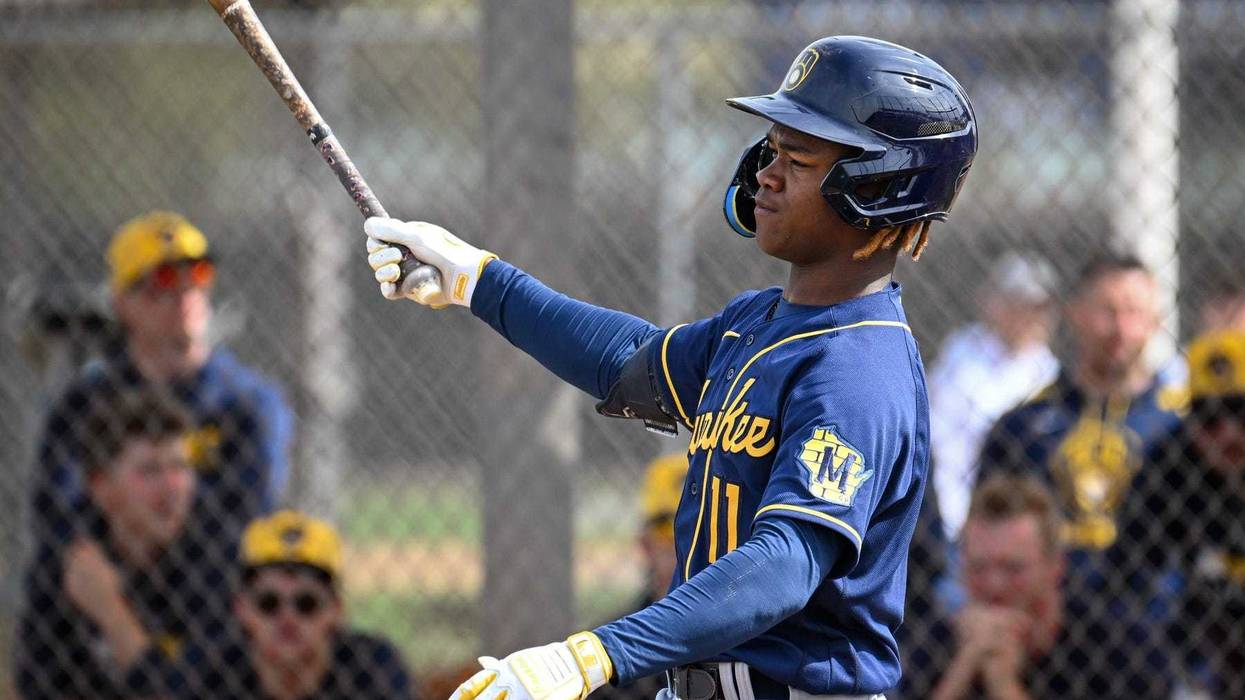 Milwaukee Brewers shortstop prospect Jesus Made swings the bat during spring training workouts Monday, February 17, 2025, at American Family Fields of Phoenix in Phoenix, Arizona.