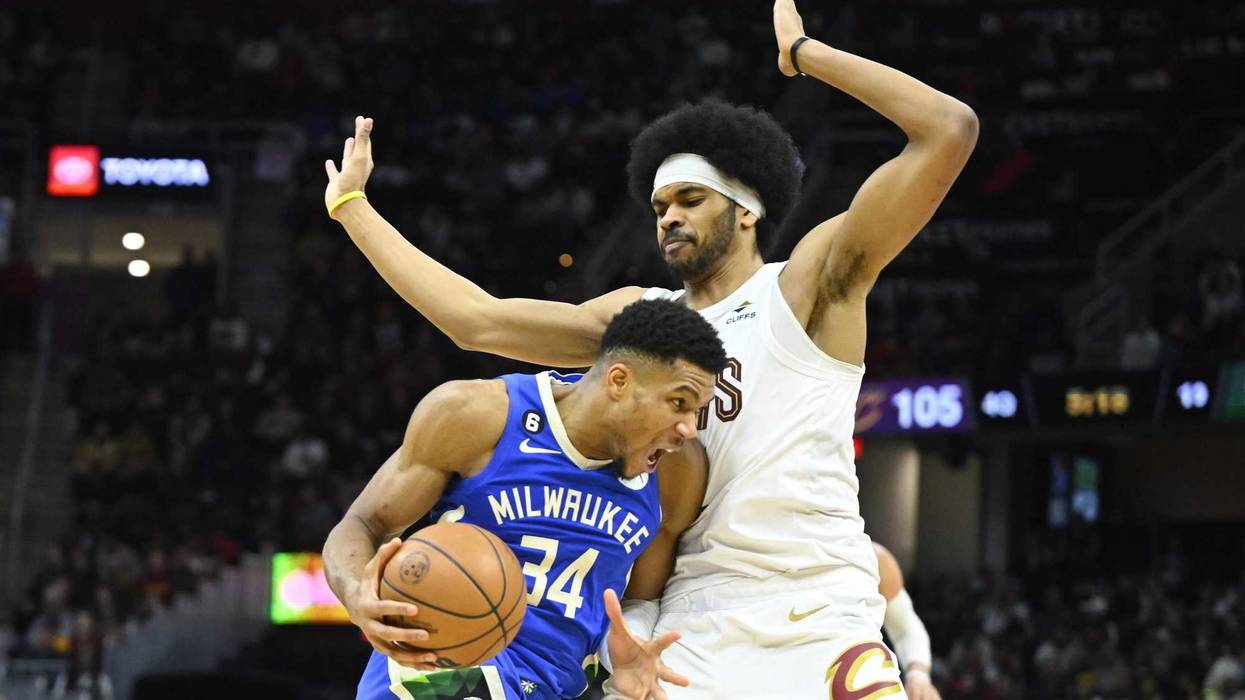 Milwaukee Bucks forward Giannis Antetokounmpo (34) drives against Cleveland Cavaliers center Jarrett Allen (31)