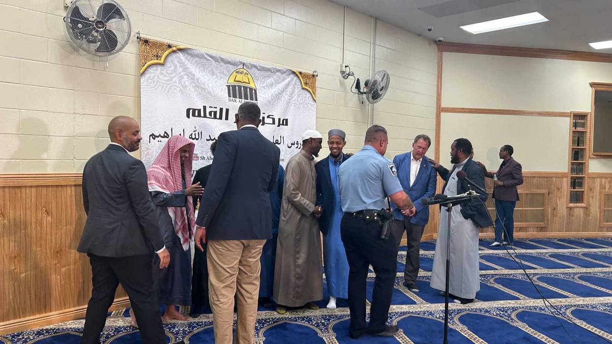 Minneapolis Police Chief Brian O'Hara (center) meets with members of the Dar Al-Qalam Islamic Center in Northeast Minneapolis Tuesday.