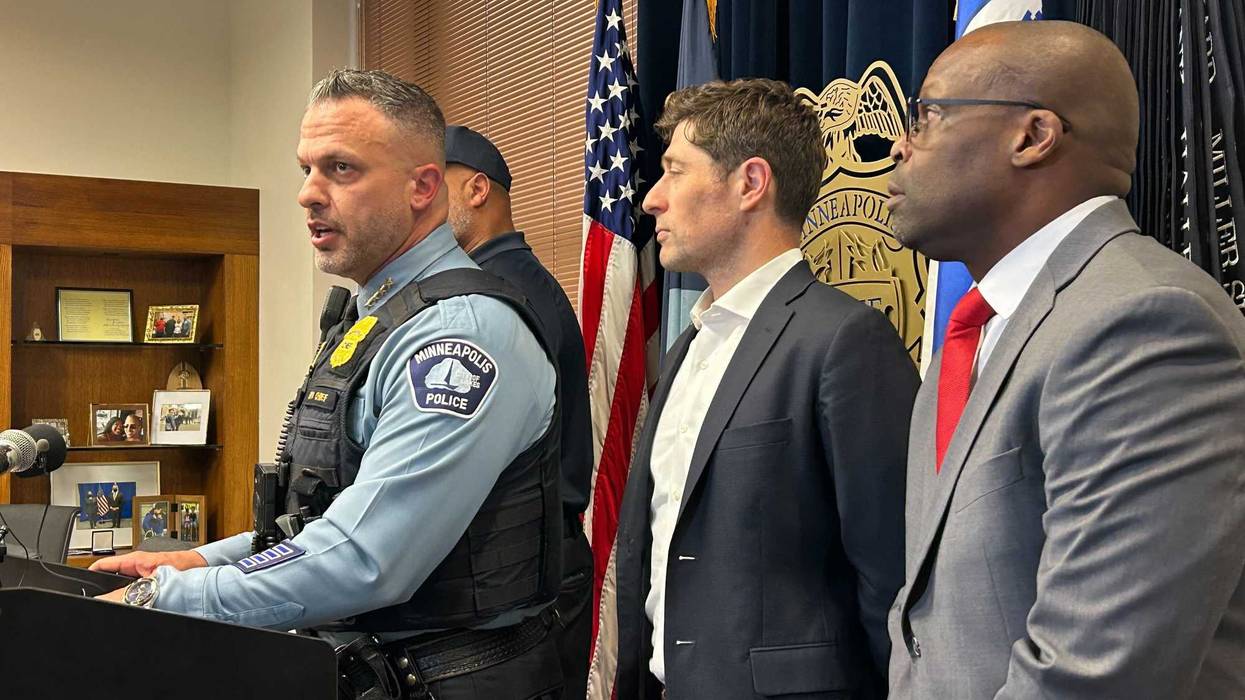 Minneapolis Police Chief Brian O'Hara (left) and Mayor Jacob Frey (center) announcing the arrest of a suspect in a deadly shooting Tuesday night.