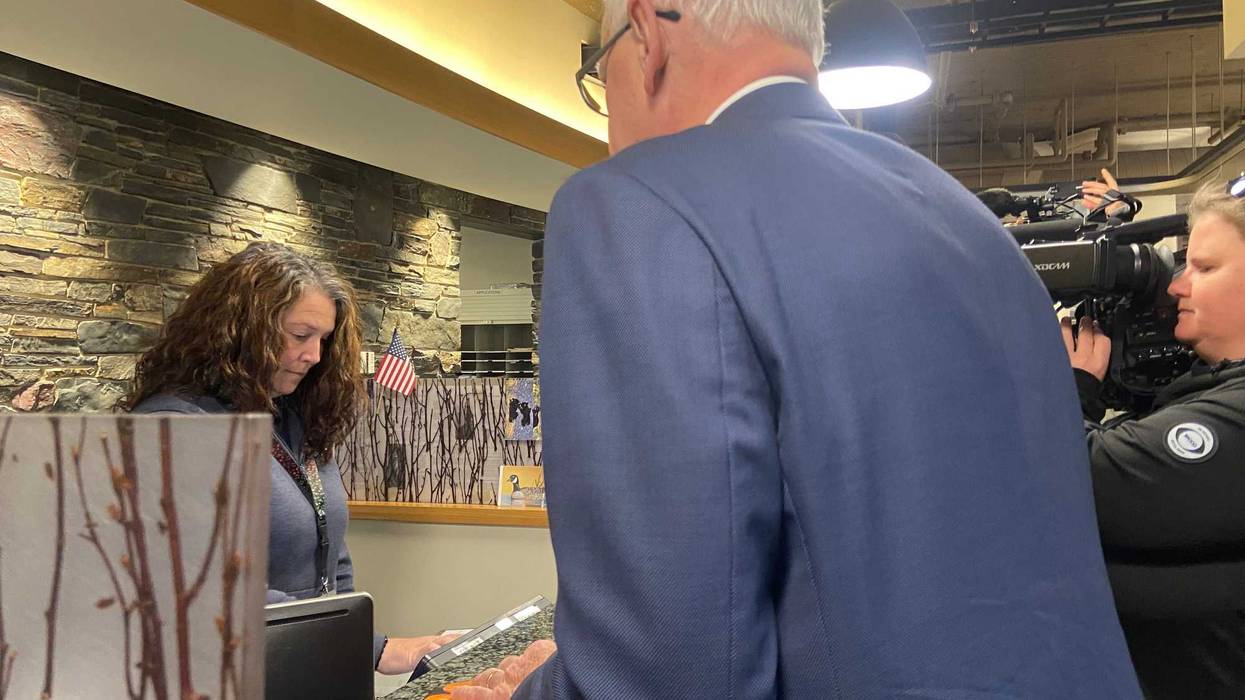 Minnesota Governor Tim Walz purchasing his deer license this past week.