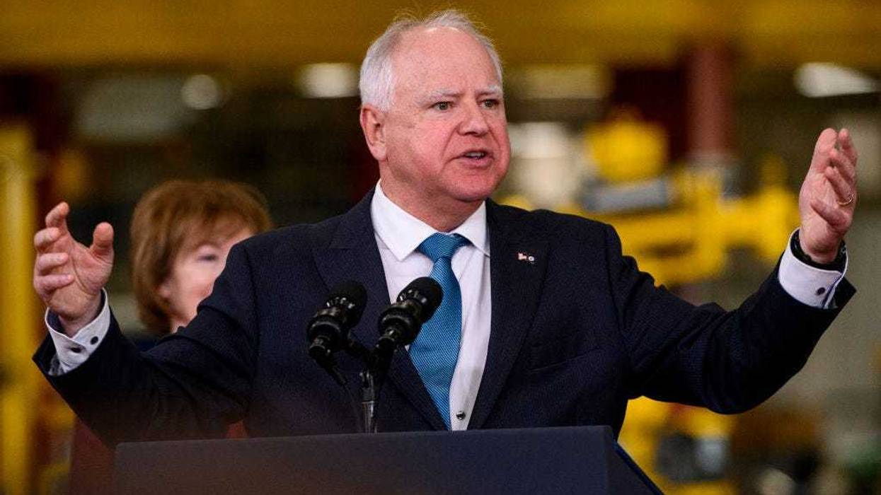 Minnesota Governor Tim Walz speaks during a visit by U.S. President Joe Biden to the Cummins Power Generation facility on April 3, 2023 in Fridley, Minnesota.