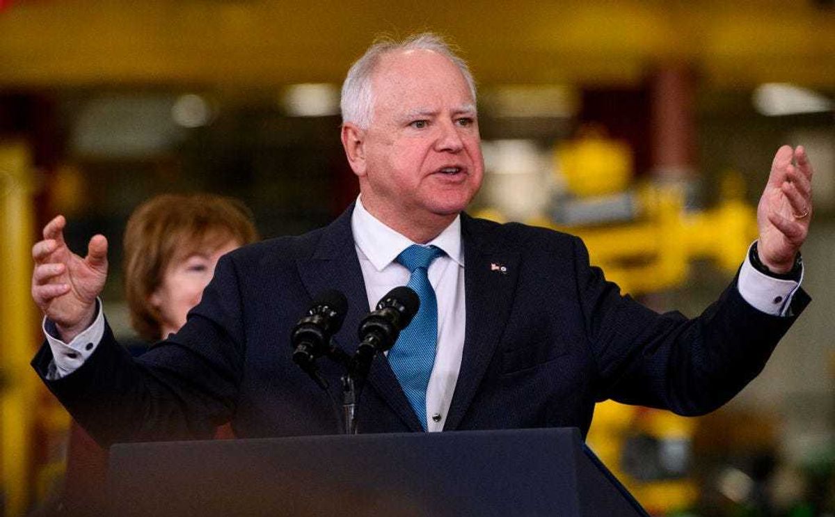 Minnesota Governor Tim Walz speaks during a visit by U.S. President Joe Biden to the Cummins Power Generation facility on April 3, 2023 in Fridley, Minnesota.