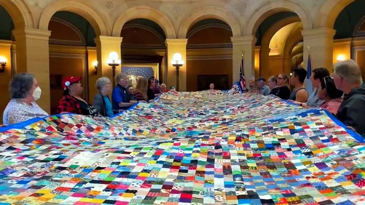 Minnesota Immigrant Rights Action Committee unveil massive 11,000 patch quilt made in protest against ICE