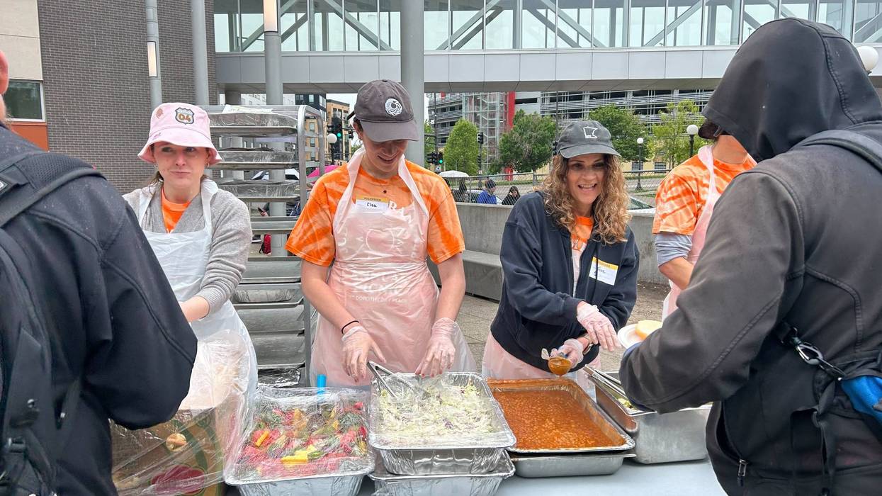 Minnesota Chief Justice Theodora Gaïtas connects with community at the Catholic Charities 23rd annual cookout