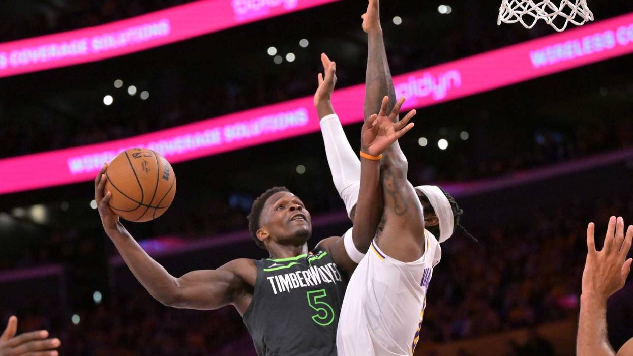 Minnesota Timberwolves guard Anthony Edwards (5) is defended by Los Angeles Lakers forward Jarred Vanderbilt (2) in the second half at Crypto.com Arena.