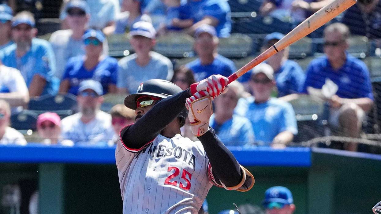 Minnesota Twins center fielder Byron Buxton (25) hits a solo home run against the Kansas City Royals during the first inning at Kauffman Stadium.