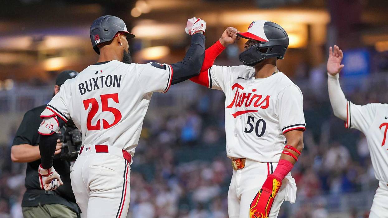 Minnesota Twins outfielder Byron Buxton (25) celebrates his home run with outfielder Willi Castro (50) against the Baltimore Orioles in the seventh inning at Target Field.