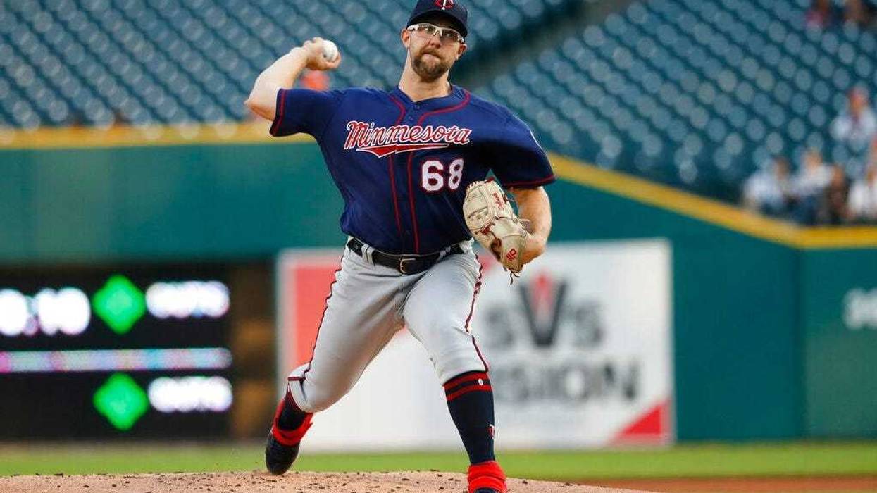 Minnesota Twins pitcher Randy Dobnak throws against the Detroit Tigers in the first inning of a baseball game in Detroit, Wednesday, Sept. 25, 2019.