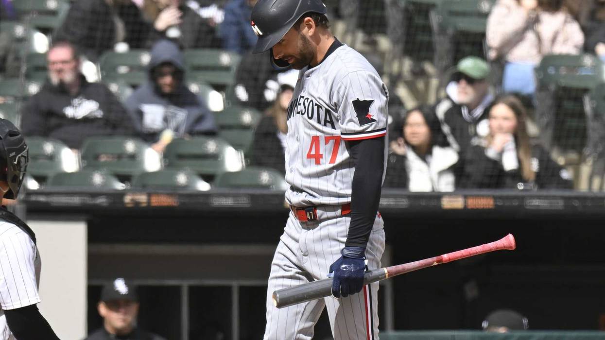 Minnesota Twins second base Edouard Julien (47) after striking out swinging against the Chicago White Sox during the sixth inning at Guaranteed Rate Field.