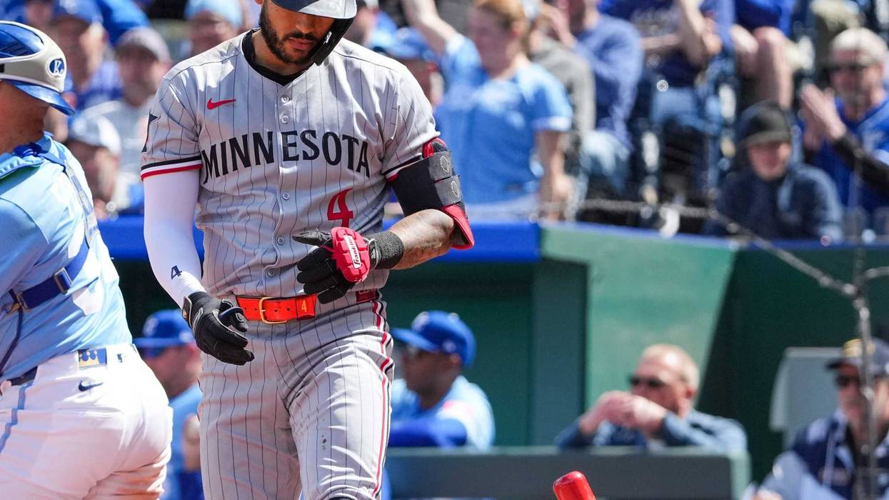 Minnesota Twins shortstop Carlos Correa (4) reacts after striking out against the Kansas City Royals in the sixth inning at Kauffman Stadium.