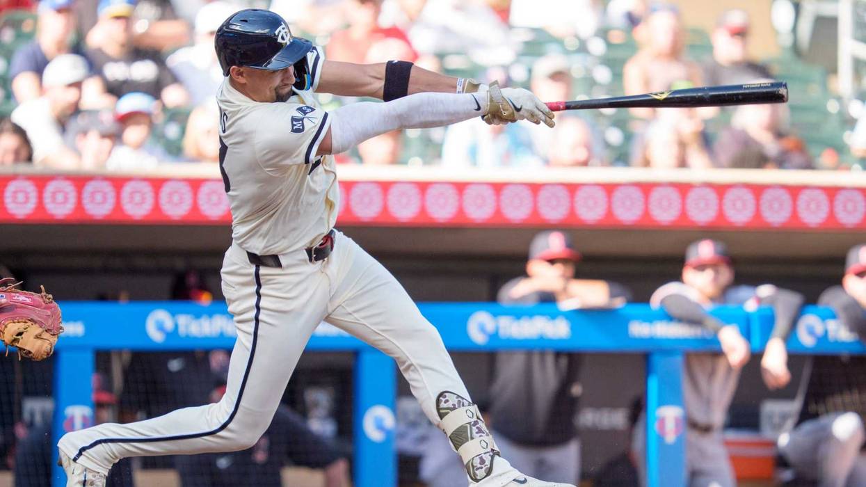 Minnesota Twins third base Royce Lewis (23) swings at a Cleveland Guardians pitcher Hunter Gaddis (33) pitch in the seventh inning at Target Field.