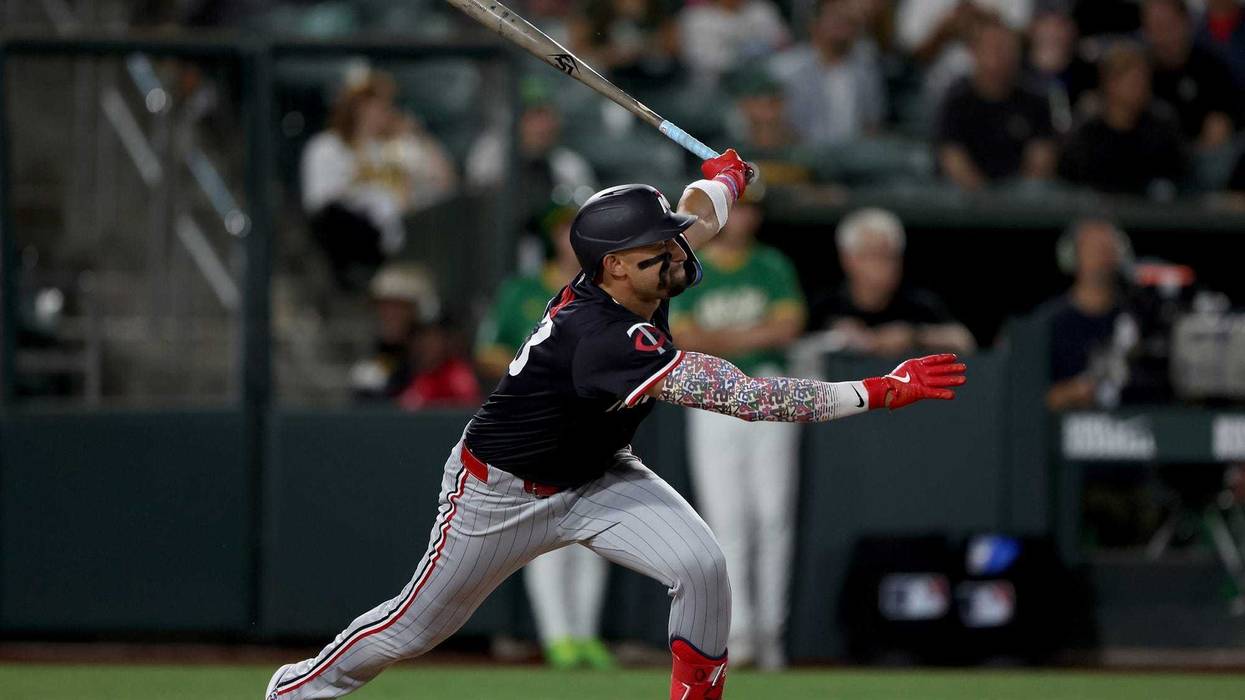 Minnesota Twins third baseman Royce Lewis (23) hits a two run RBI double against the Athletics at Sutter Health Park.