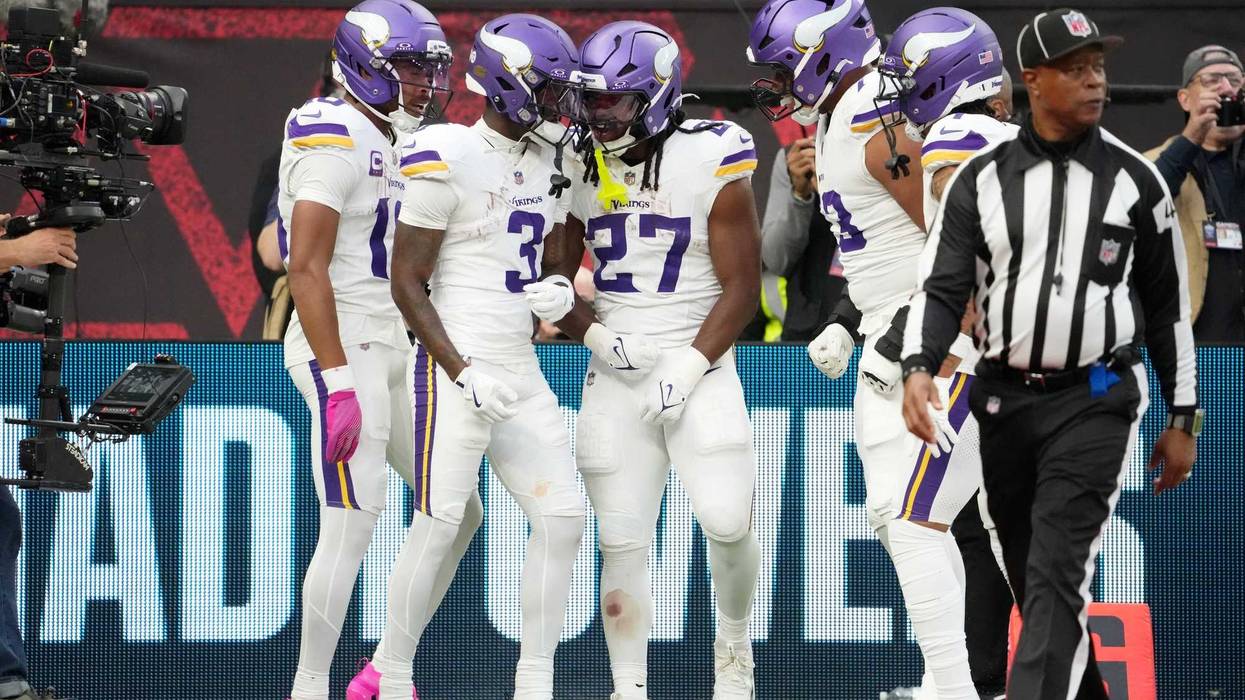 Minnesota Vikings wide receiver Jordan Addison (3) celebrates with teammates after a touchdown against the Cleveland Browns during the fourth quarter of an NFL International Series game at Tottenham Hotspur Stadium.