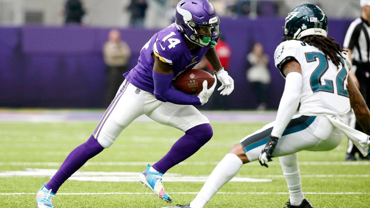 Minnesota Vikings wide receiver Stefon Diggs, left, runs from Philadelphia Eagles cornerback Sidney Jones, right, after catching a pass during the first half.
