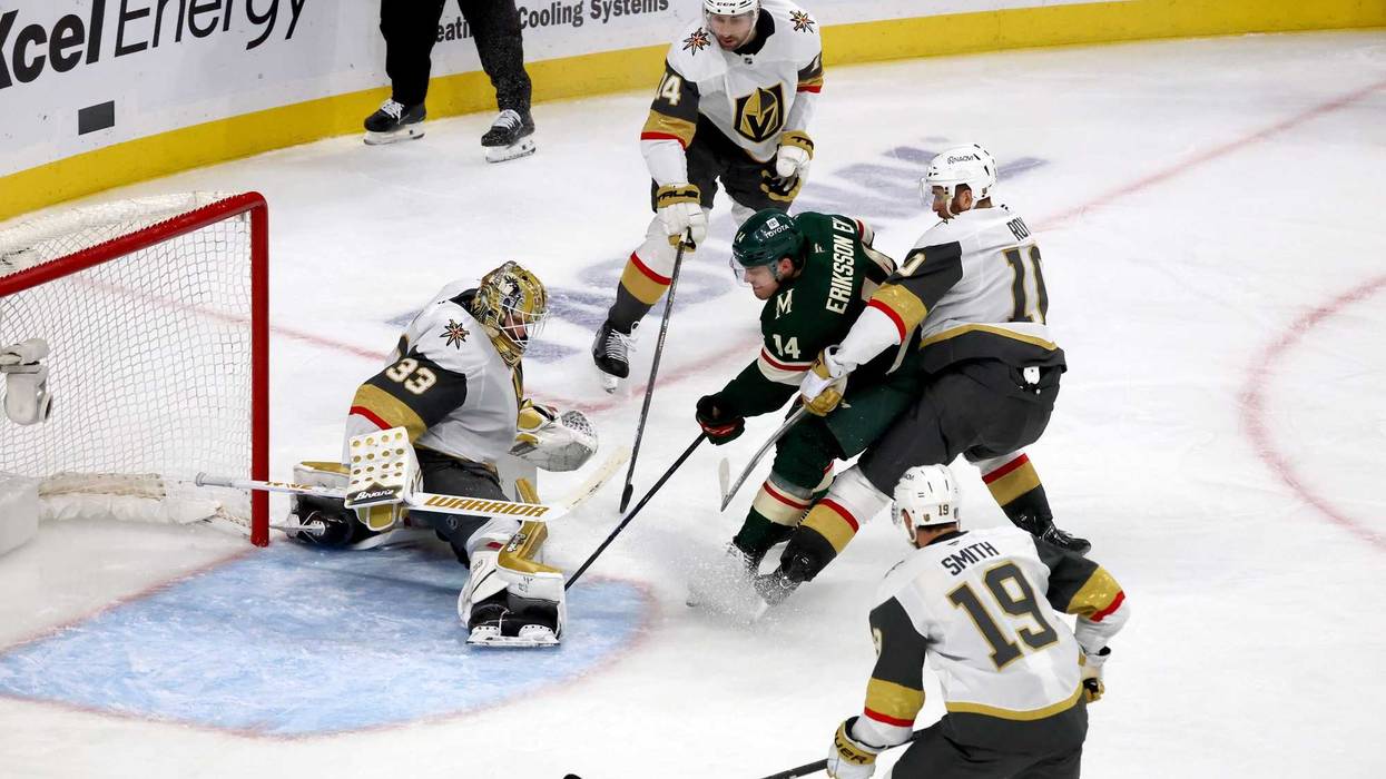 Minnesota Wild center Joel Eriksson Ek (14) crashes the net during 1st OT in game four of the first round of the 2025 Stanley Cup Playoffs at Xcel Energy Center. Vegas pulled out a 4-3 win to tie the series at two.