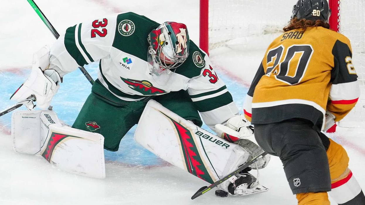 Minnesota Wild goaltender Filip Gustavsson (32) makes a save against Vegas Golden Knights left wing Brandon Saad (20) during the third period of game one of the first round of the 2025 Stanley Cup Playoffs at T-Mobile Arena.
