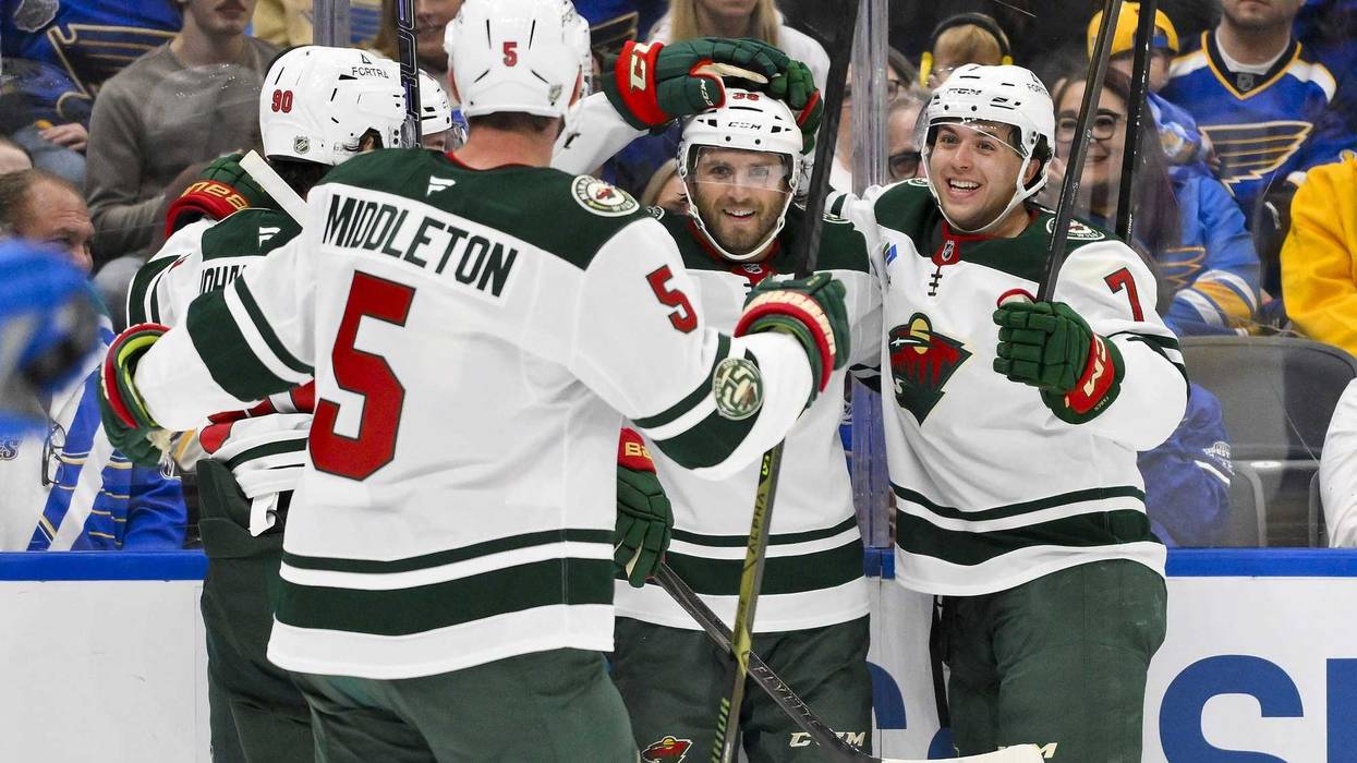 Minnesota Wild right wing Ryan Hartman (38) is congratulated by teammates after scoring against the St. Louis Blues during the first period at Enterprise Center.