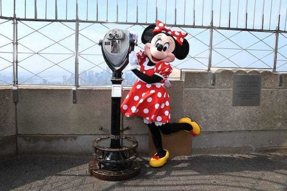 Minnie Mouse is getting a makeover and will trade iconic red dress for blue pantsuit