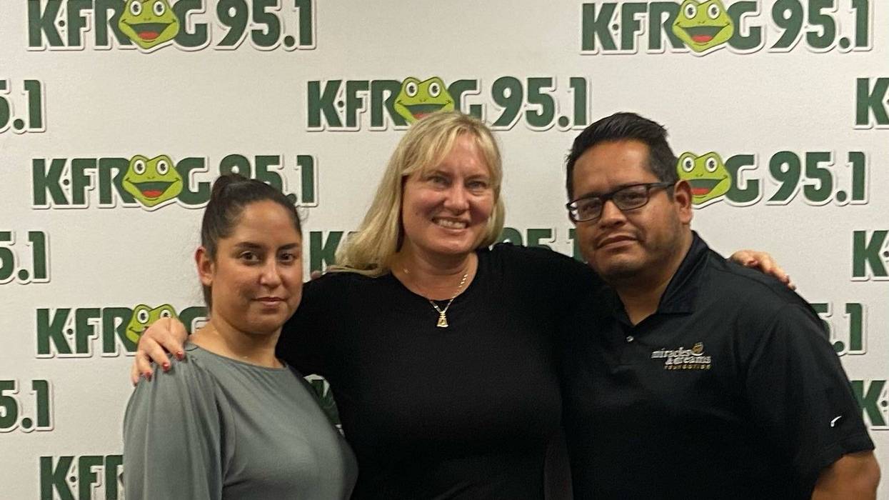 Miracles and Dreams Foundation's Liza Sosa and Joe Ramos with K-Frog's Pepper