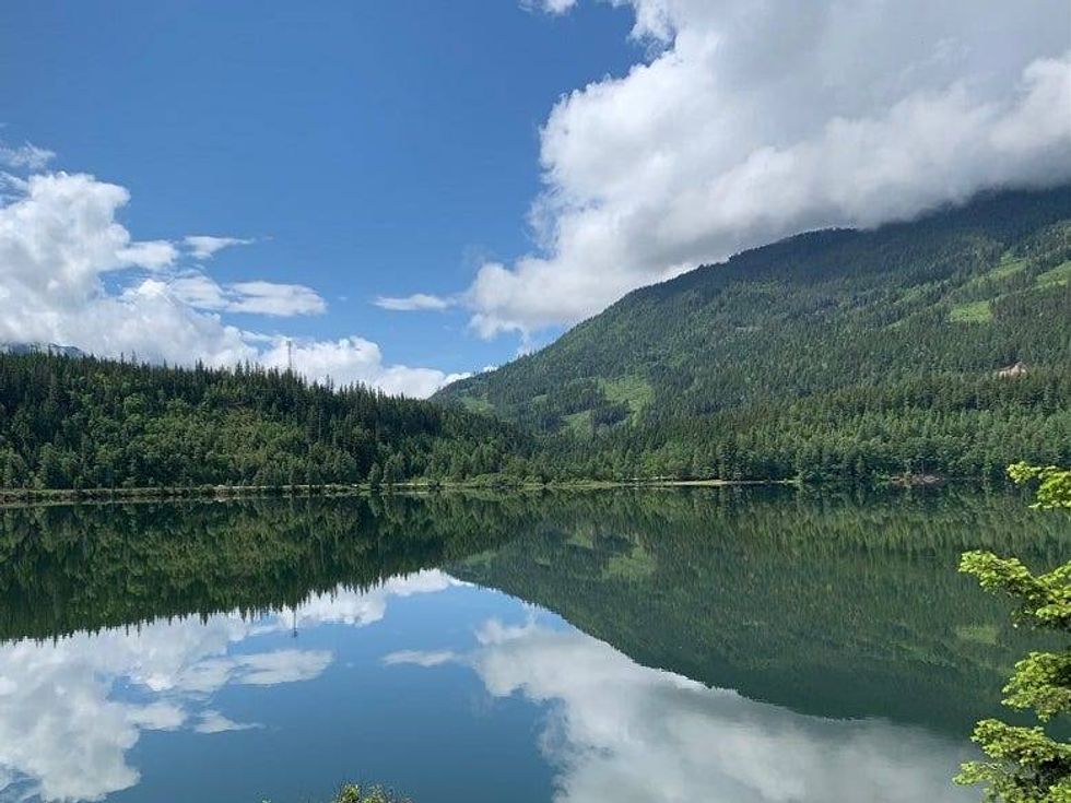 Mirror image in lake from our train