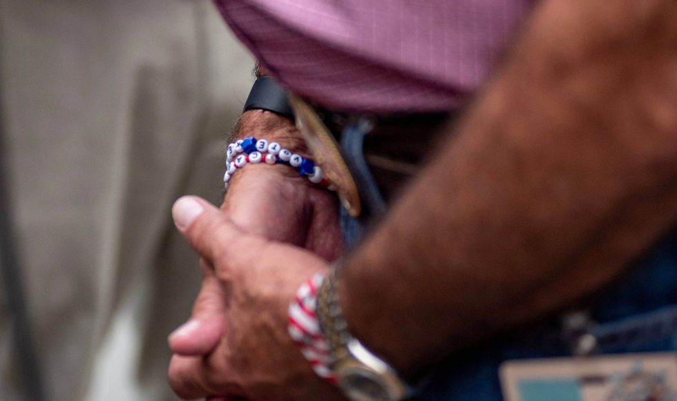 Missouri Lieutenant Governor Mike Kehoe, who is the Republican nominee for Governor, wears a "Vote Kehoe" bracelet to the Missouri State Fair in Sedalia Thursday.