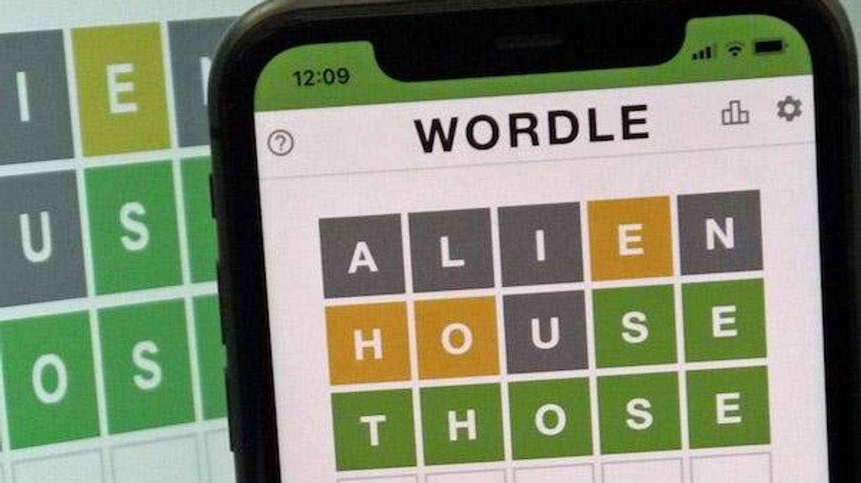 Mobile phone showing the screen of the game Wordle