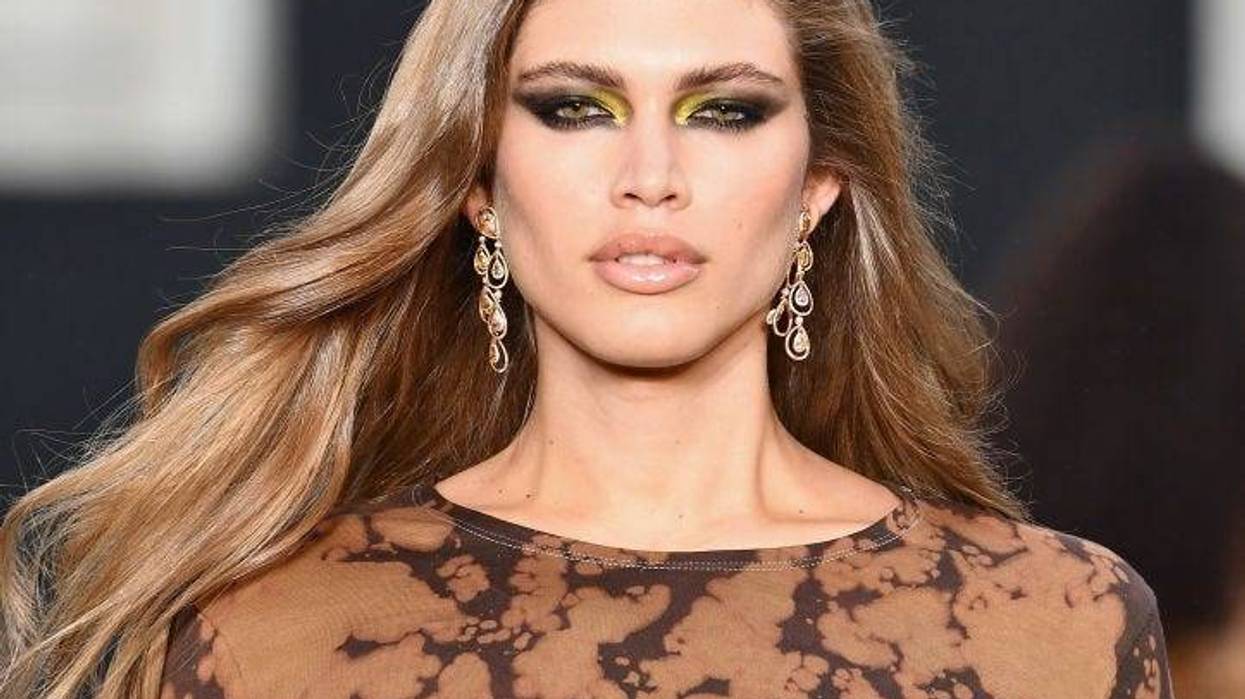 Model Valentina Sampaio struts the catwalk during a fashion show.