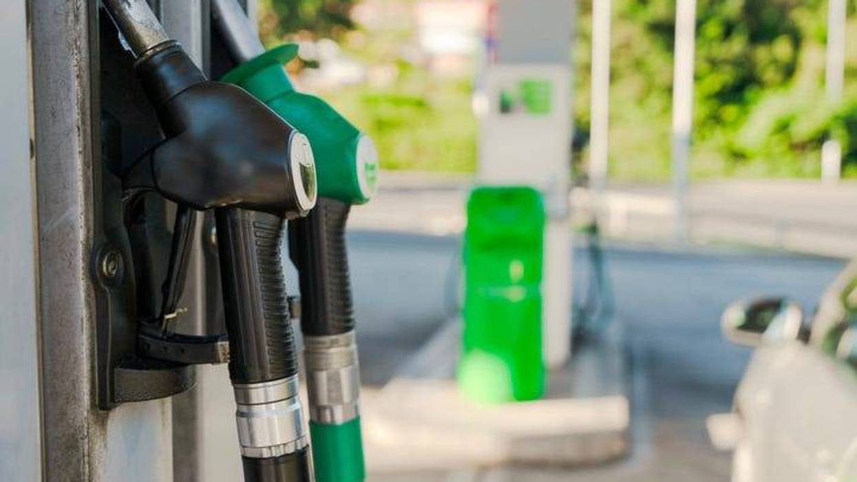 Modern gas station with diesel and petrol nozzles, capturing the essence of fuel supply for everyday travel and convenience