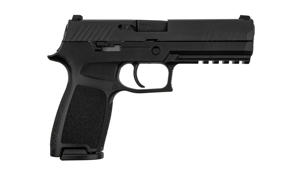Modern semi-automatic pistol isolate on a white background. Armament for the army and police. Short-barreled weapon.