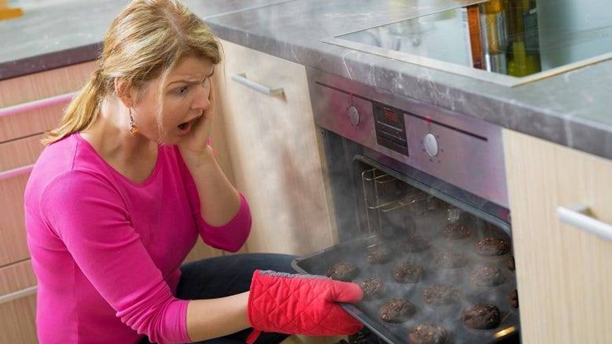 Mom opening oven door