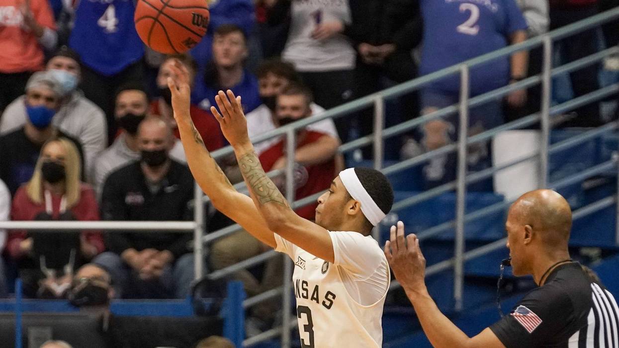 Monday night wins for Jayhawks and Wildcats