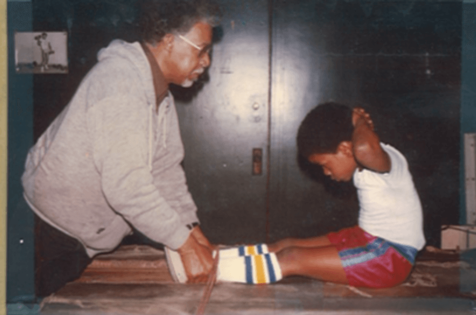 Montell Griffin training with his father at a young age