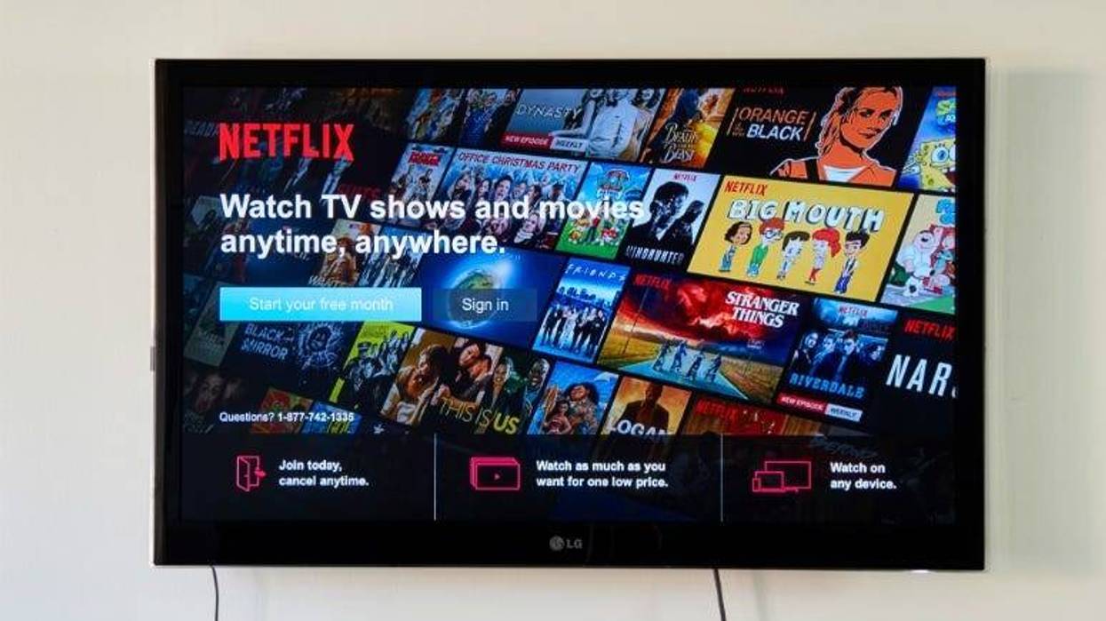 MONTREAL, CANADA - NOVEMBER 15, 2017: Netflix Sign In and free trial page on LG TV. Netflix is an American entertainment company founded by Reed Hastings and Marc Randolph on August 1997, in CA USA