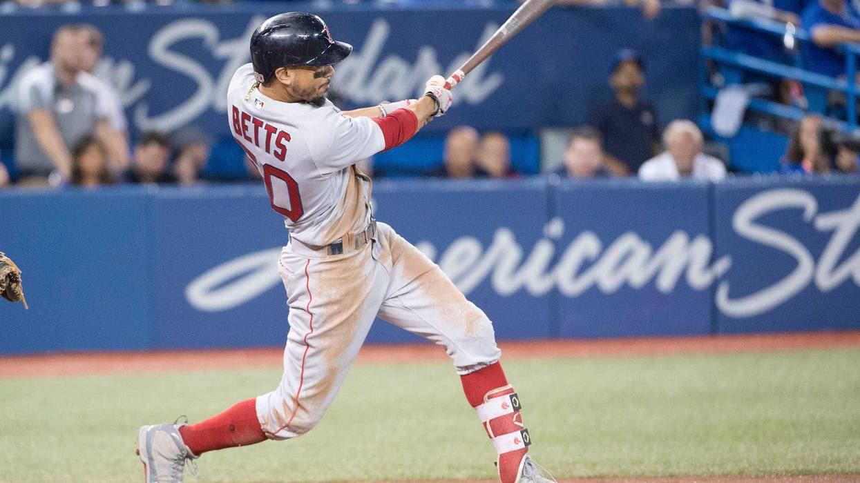 Mookie Betts hitting a home run in the ninth inning completing his first cycle against the Toronto Blue Jays